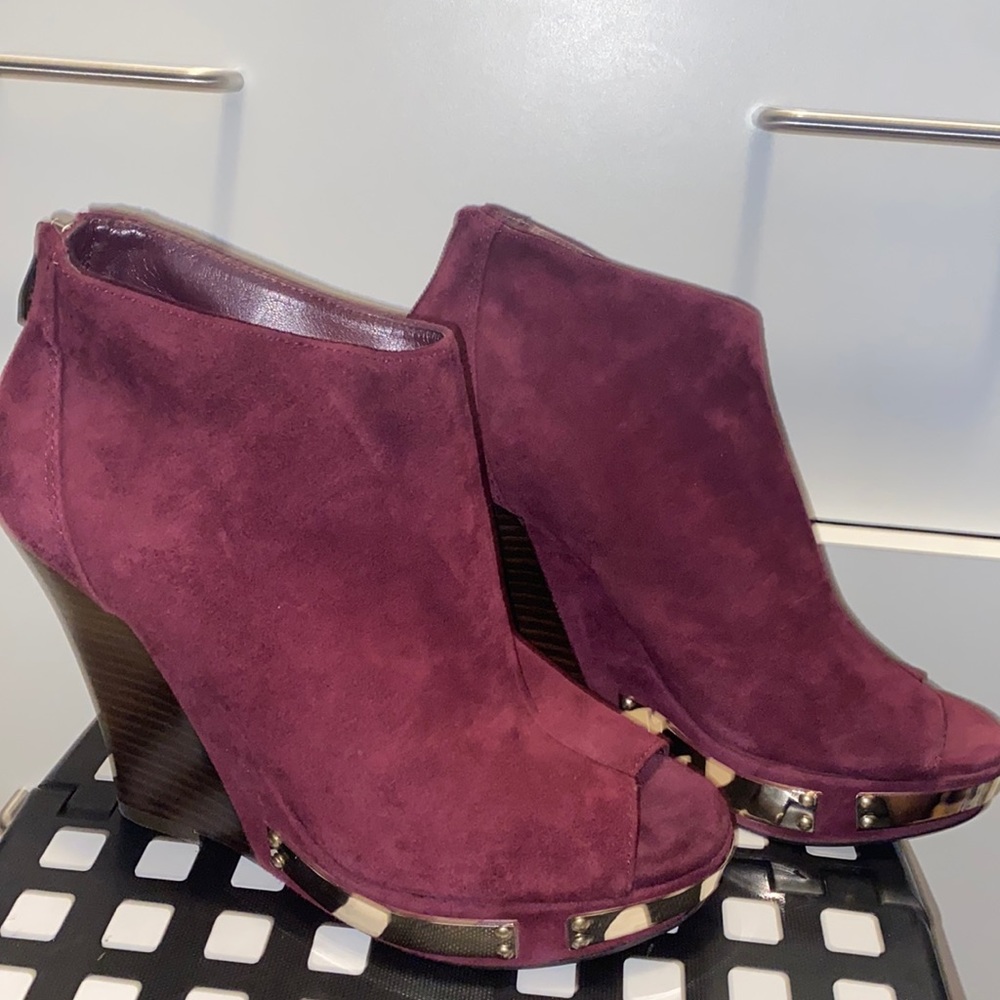 Brand new Burgundy, Vince Camuto open toe platform with gold plated accents.